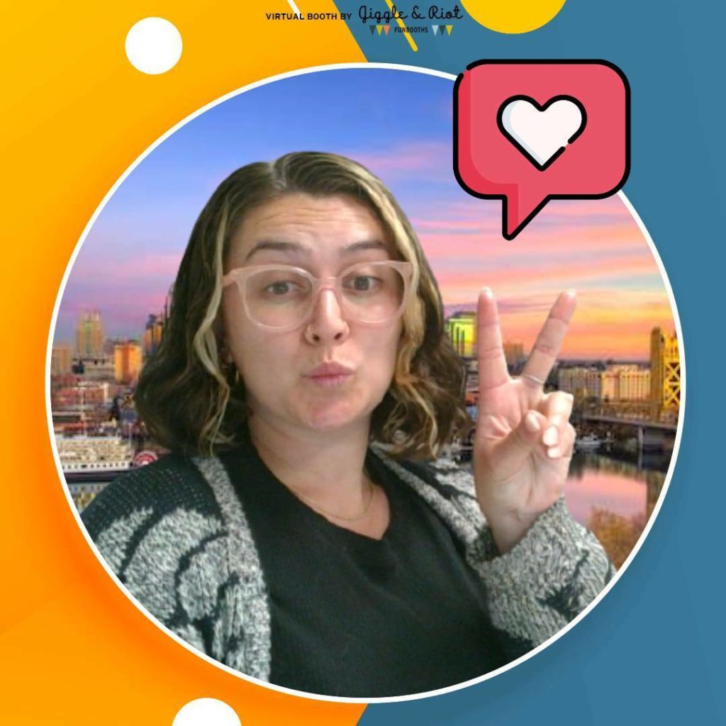 woman poses for giggle and riot virtual photobooth with heart sticker